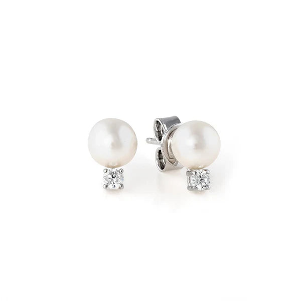 A pair of pearl stud earrings with accents, finished in pure platinum.