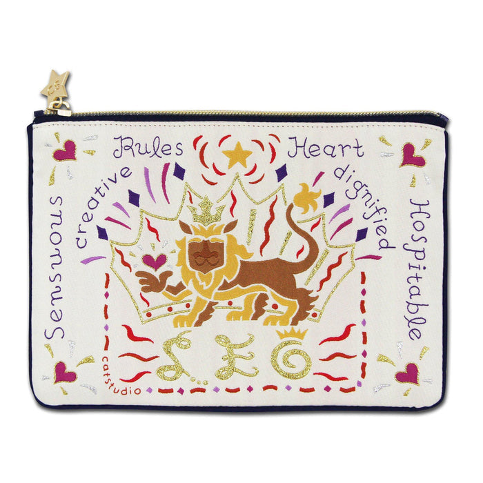 A multicolored zip pouch with an illustration of a lion in the center, and various adjectives such as 'Rules', 'Heart', 'Sensuous', 'Creative', and 'Hospitable' painted around it.
