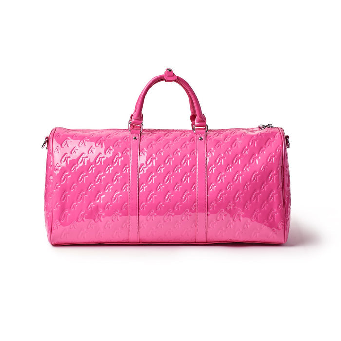 Pink Monogram Duffle Bag with embossed logo pattern, dual handles, and zipper closure, stylish for travel or gym use.