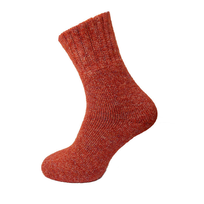 Red thick sock on a white background