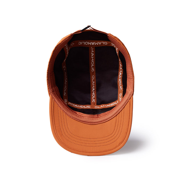Brown athletic 5 panel hat featuring a sleek design and a comfortable interior with Glam-Aholic branding.