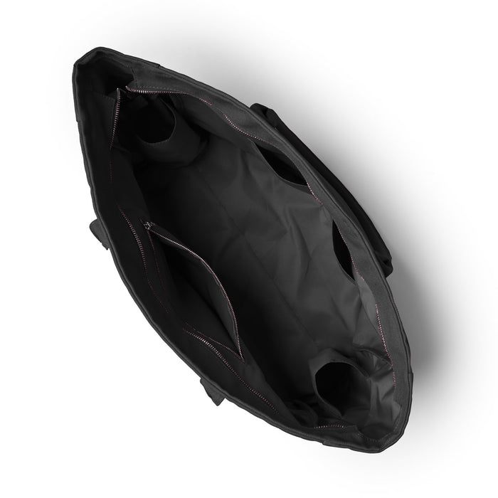 Black athletic canvas tote bag viewed from above, showcasing spacious interior with pockets and sturdy handles.