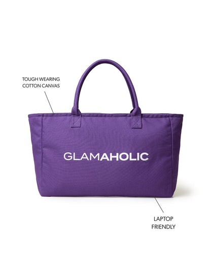 Purple athletic canvas tote bag with sturdy handles, designed for durability and laptop-friendly use.
