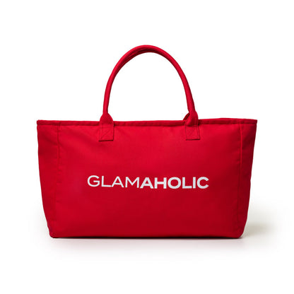 Red athletic canvas tote bag featuring the Glam-Aholic logo prominently displayed on the front.