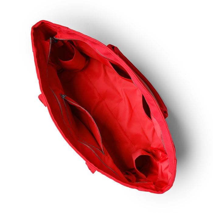 Red athletic canvas tote bag viewed from above, featuring spacious interior with pockets and sturdy handles.
