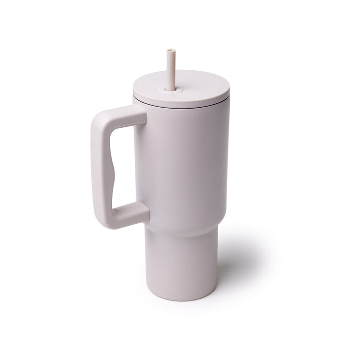 Nude athletic tumbler with a handle and straw, designed for easy sipping and on-the-go hydration.