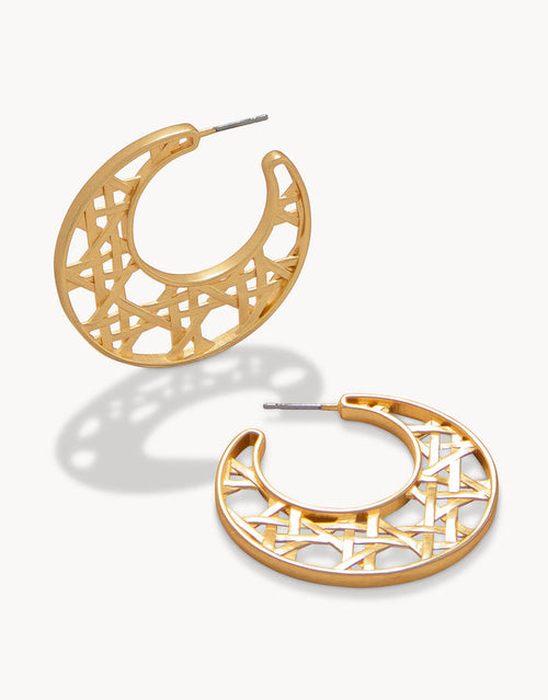 A pair of matte 18kt gold plated cane hoop earrings.