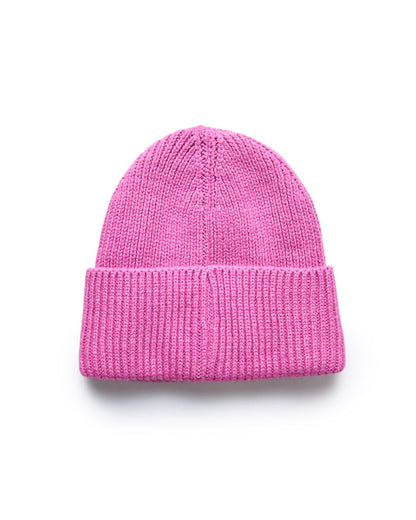 Pink knit beanie hat with a folded cuff, perfect for cold weather and stylish casual wear.