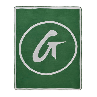 Classic green throw blanket featuring a large white logo in the center, perfect for cozying up in style.