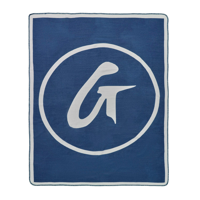 Navy classic throw blanket featuring a large white logo, perfect for adding style and comfort to any space.