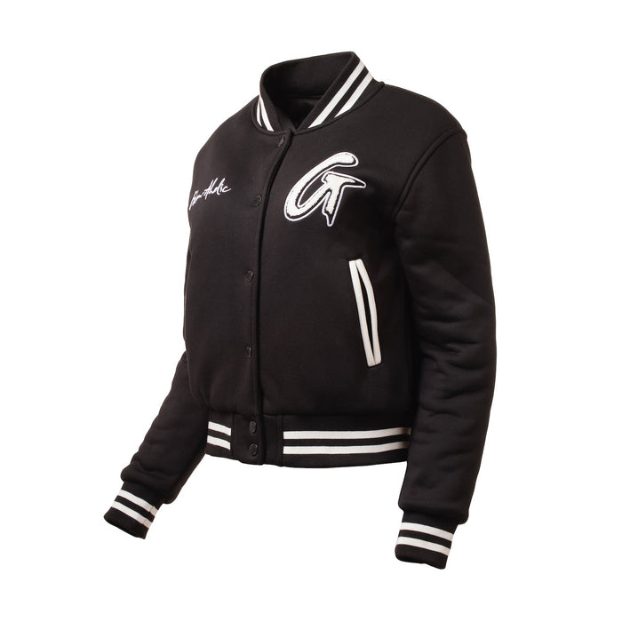 Black varsity jacket with white striped cuffs, collar, and waistband, featuring embroidered patches and a snap button closure.