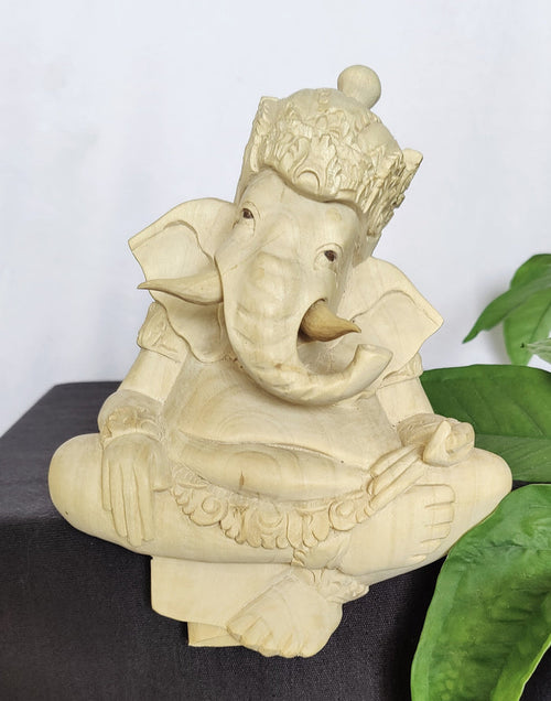 Home Decor Idol. Wooden Carved Lord Ganesha in Sitting Posture.