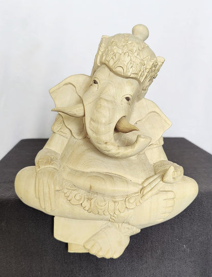 Home Decor Idol. Wooden Carved Lord Ganesha in Sitting Posture.