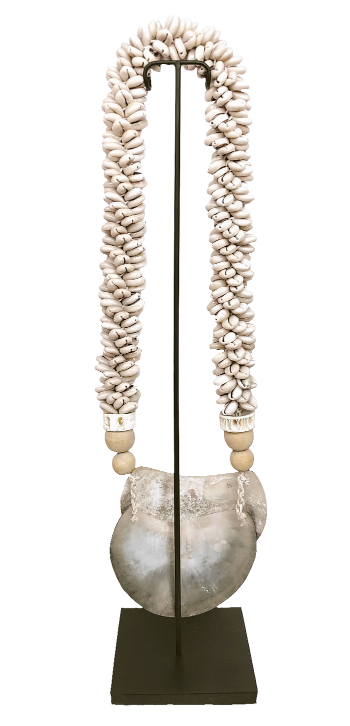 Home Decor. Mother Of Pearl Crescent Necklace with Shells and Wooden Beads on stand.