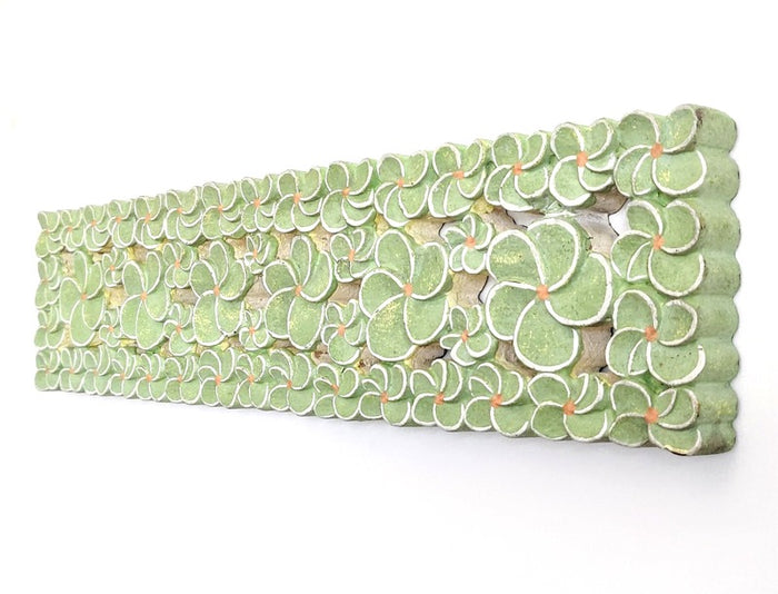 Home Decor: Wall Hanging.
Hand Carved Wooden panel with floral motifs.