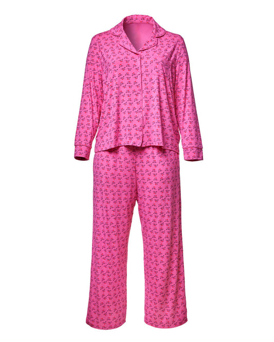 Hot pink pajama set featuring a button-up top and matching pants with a playful pattern, perfect for cozy nights.
