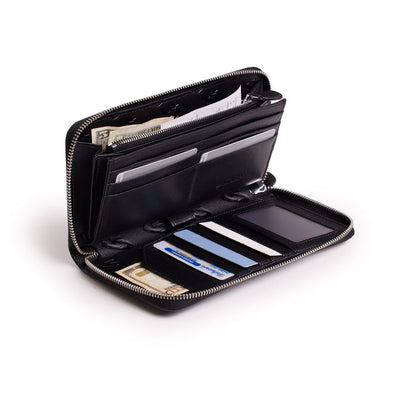 Black matte jumbo monogram wallet with multiple card slots, cash compartments, and a zippered coin pocket, open to show organization.