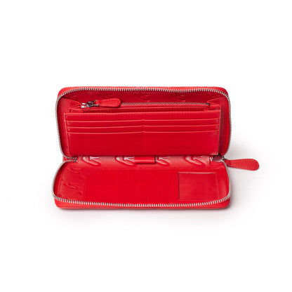 Red jumbo monogram wallet with multiple card slots, zippered coin pocket, and interior compartments, open to show interior details.