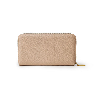 Jumbo pebble wallet in nude color with textured leather, gold zipper pull, and spacious design.