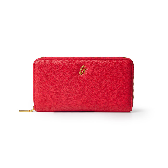 Red jumbo pebble wallet with a textured finish and a gold logo, featuring a zip closure for secure storage.