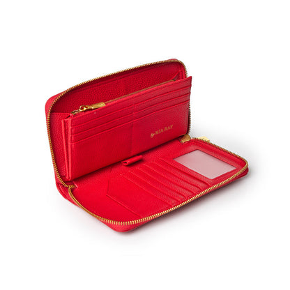 Red jumbo pebble wallet with multiple card slots, zippered coin pocket, and transparent ID window, open to show interior.