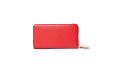 Red jumbo signature logo wallet with a zipper closure, displayed against a white background.