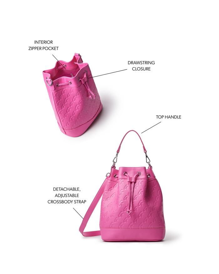Hot pink large monogram bucket bag featuring a drawstring closure, top handle, and adjustable crossbody strap.