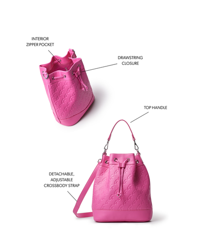 Hot pink large monogram bucket bag featuring a drawstring closure, top handle, and adjustable crossbody strap.