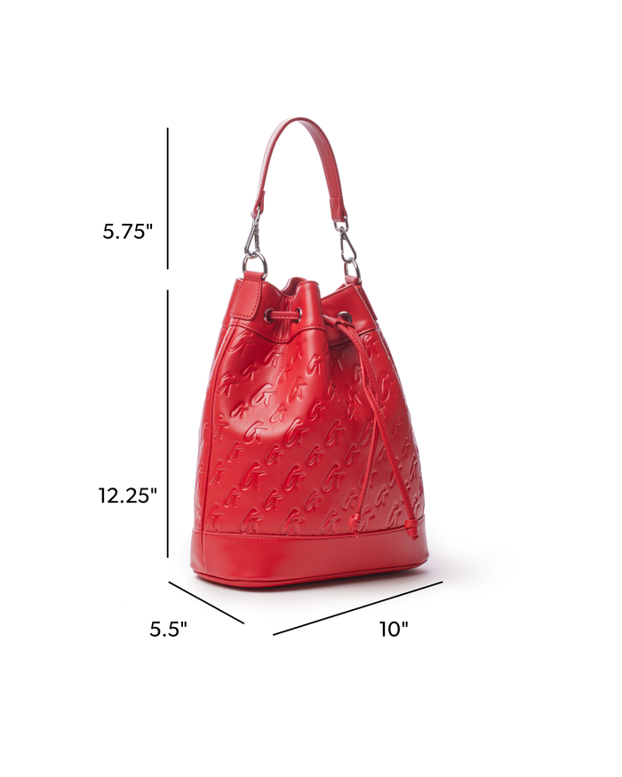 Large red monogram bucket bag with drawstring closure and silver hardware, measuring 12.25 inches tall and 10 inches wide.