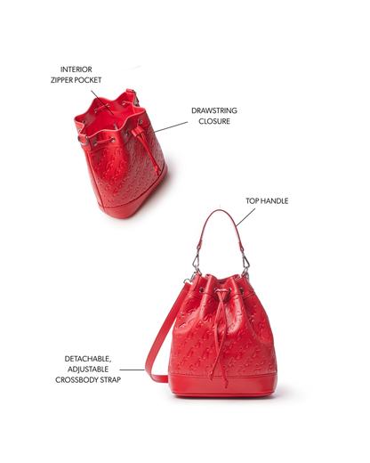 Large red monogram bucket bag featuring a drawstring closure, top handle, and detachable adjustable crossbody strap.