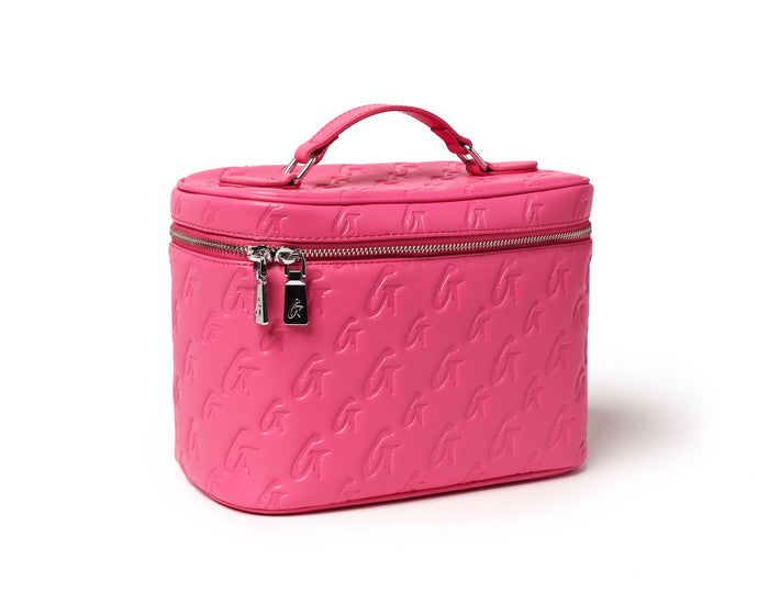Large hot pink monogram toiletry bag with embossed logo pattern and silver zipper, ideal for travel essentials.
