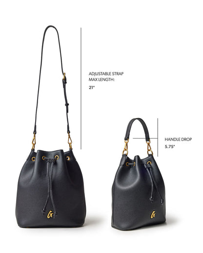Large black pebble bucket bag with adjustable strap and gold accents, perfect for stylish everyday use.