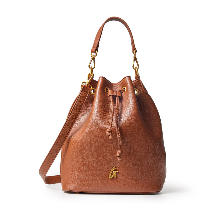 Large brown pebble bucket bag with gold hardware, adjustable strap, and drawstring closure.