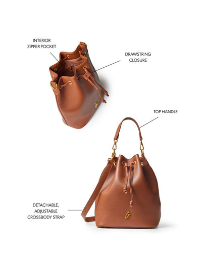 Large brown pebble bucket bag featuring a drawstring closure, top handle, and adjustable crossbody strap.