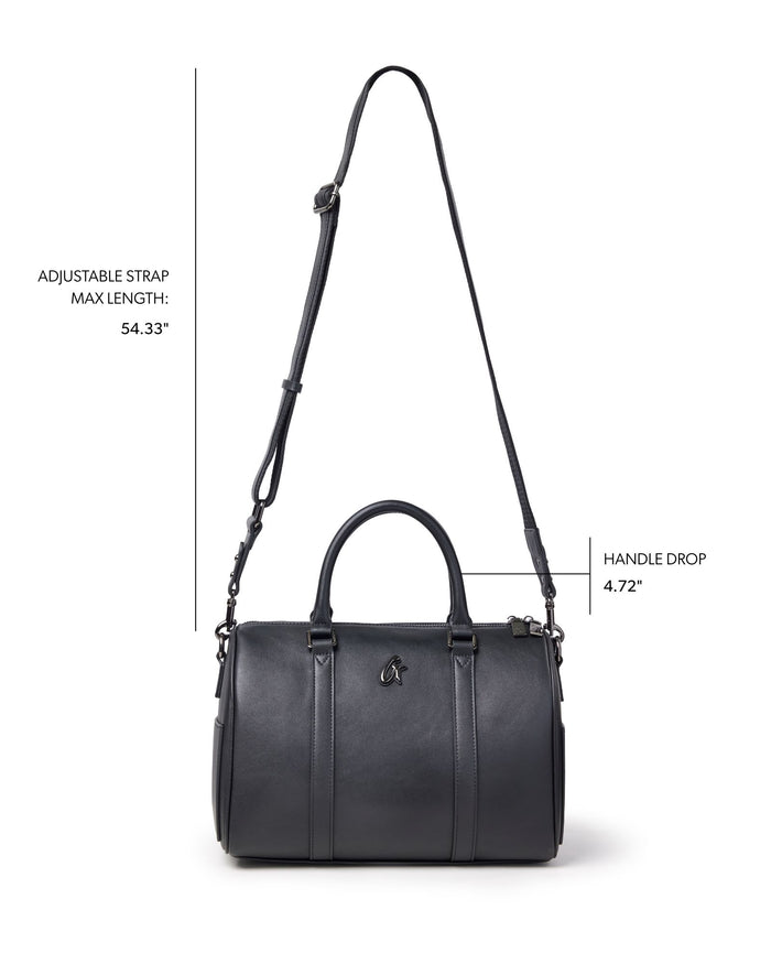 Large black Boston bag with adjustable strap and dual handles, perfect for stylish everyday use.