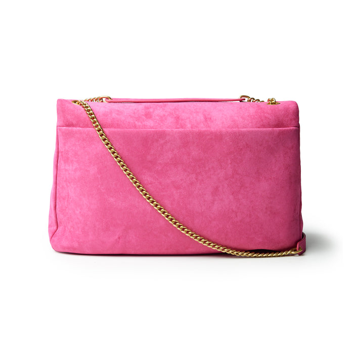 Large hot pink suede flap bag with a gold chain strap, perfect for adding a pop of color to any outfit.