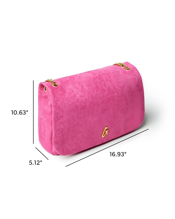 Hot pink large suede flap bag with gold hardware, measuring 16.93 by 10.63 by 5.12 inches. Ideal for stylish women.