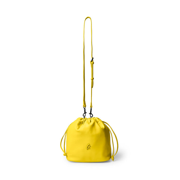 Medium yellow drawstring bucket bag with adjustable strap and logo detail, perfect for stylish everyday use.