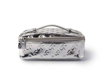 Medium metallic silver monogram toiletry bag with embossed logo pattern and zipper closure, stylish and compact for travel.