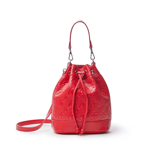 Red medium monogram bucket bag with embossed logo pattern, adjustable drawstring closure, and top handle.