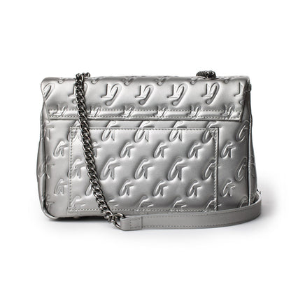Medium platinum monogram flap bag with embossed G logo pattern, chain strap, and sleek metallic finish.