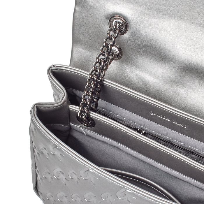 Silver medium monogram flap bag with a chain strap, interior zip pocket, and embossed logo detail.