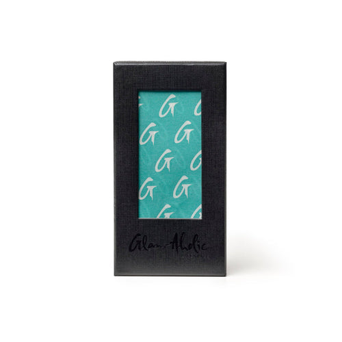 Teal medium monogram silk scarf in elegant packaging, showcasing the Glam-Aholic logo and design.