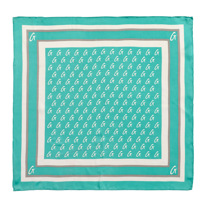 Teal medium silk scarf featuring a repeating monogram pattern and a contrasting border, perfect for stylish accessorizing.
