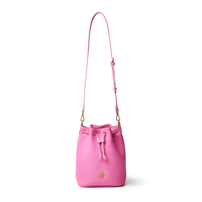 Medium hot pink pebble bucket bag with gold accents, adjustable strap, and drawstring closure.