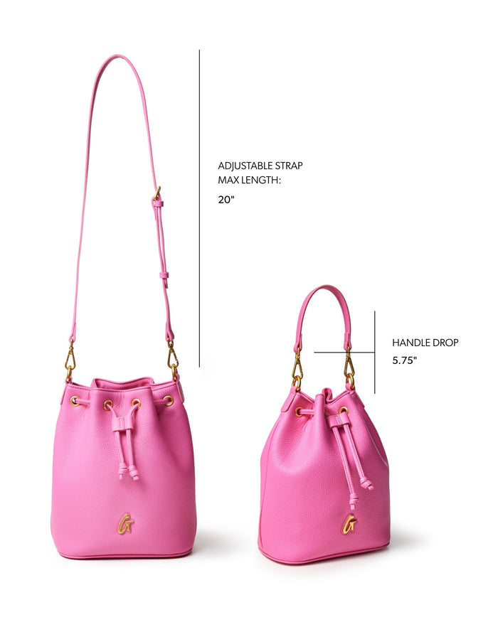 Hot pink medium pebble bucket bag with adjustable strap and gold accents, perfect for stylish everyday use.