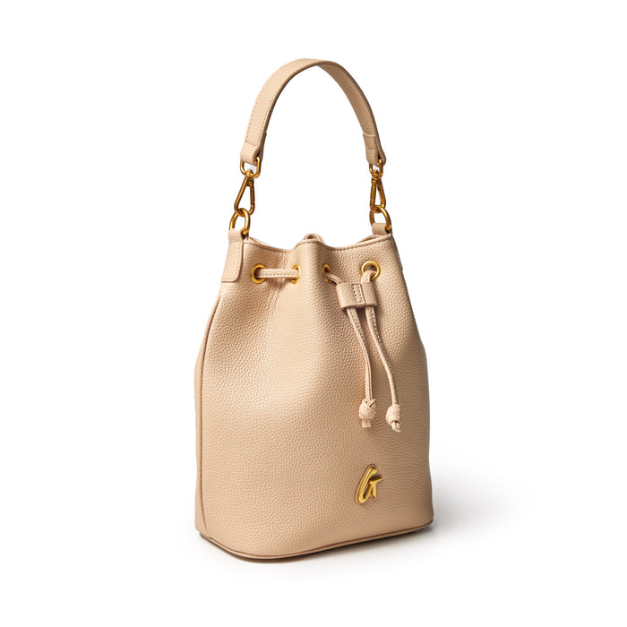 Medium nude pebble bucket bag with gold hardware, adjustable drawstring closure, and a top handle.