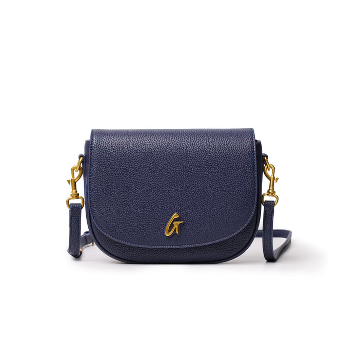 Medium navy pebble shoulder bag with gold hardware, a flap closure, and a gold "G" logo on the front.