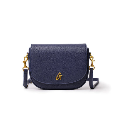 Medium navy pebble shoulder bag with gold hardware, a flap closure, and a gold "G" logo on the front.