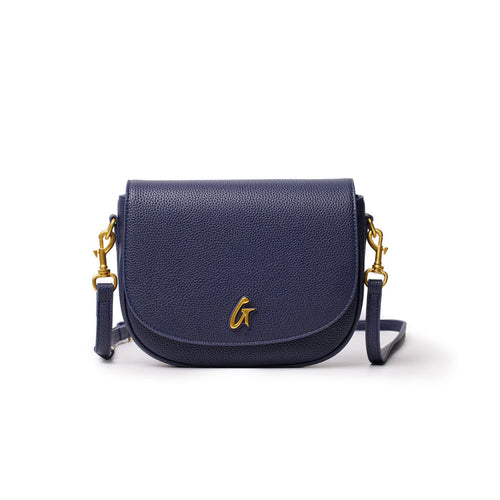Medium navy pebble shoulder bag with gold hardware, a flap closure, and a gold "G" logo on the front.